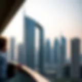 Stunning view of Ajman One Tower's modern architecture against the skyline