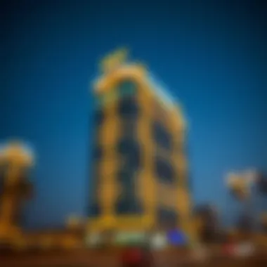 Evening shot of Al Wasl Building illuminated against the night sky.