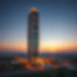 A stunning view of Aykon Tower showcasing its architectural design at sunset