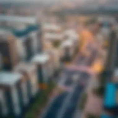 An aerial view of residential buildings and commercial spaces along Baniyas Road, emphasizing investment potential