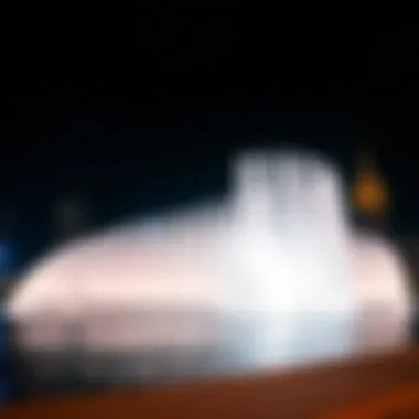 A stunning view of the Dubai Fountain illuminated at night.