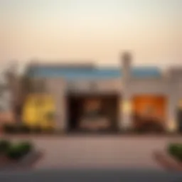 Luxurious farmhouse exterior with desert backdrop