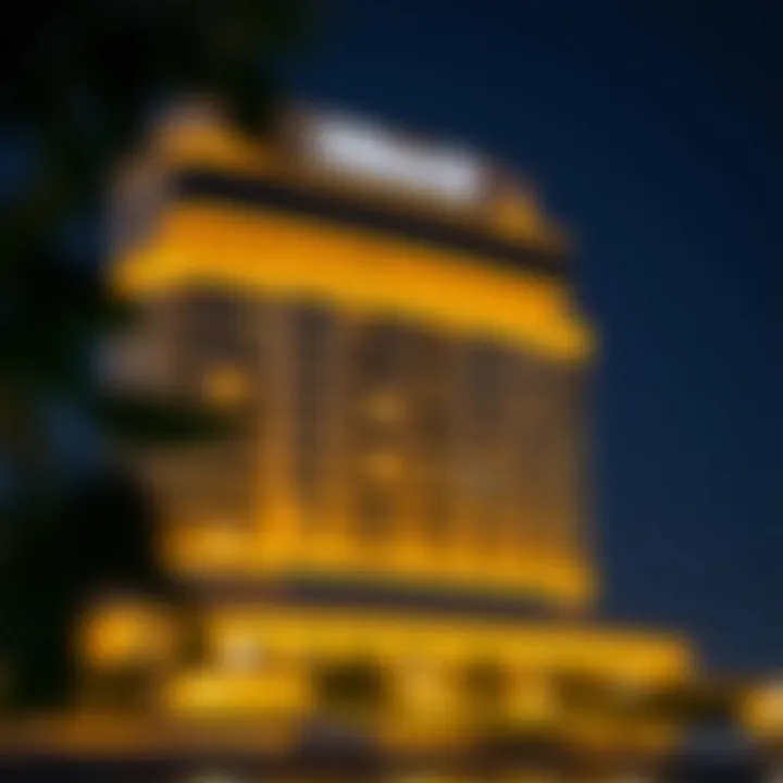 The exterior of Hilton Dubai The Creek illuminated at night