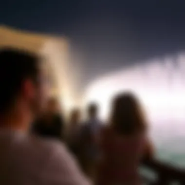 Guests Experiencing the Fountain Show Visitors enjoying the fountain show at Palm Jumeirah