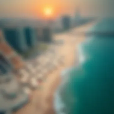 An aerial view capturing the vibrant beach life at Jumeirah Beach, illustrating the leisure activities in Dubai's summer