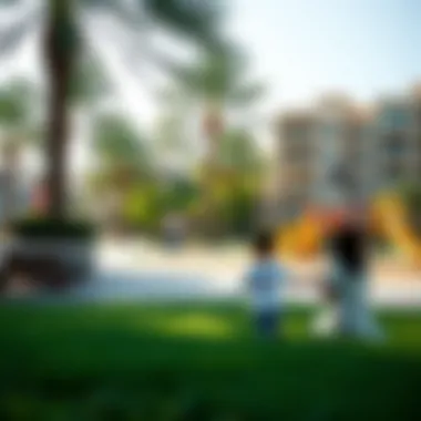 Families enjoying a spacious park area with playgrounds and picnic spots in Dubai.